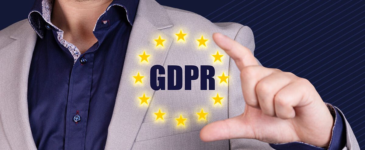 A man holding the GDPR logo
